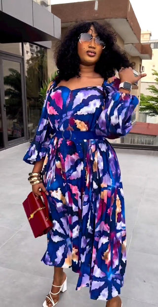 Robe midi en crêpe de soie légère avec doublure à manche longue plissée et une ceinture unie. Robe de soirée et pour des occasions spéciales